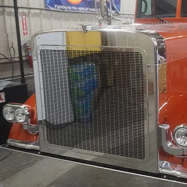 12 Gauge Customs Stainless Steel Punched Grille & Surround Kit W/ Oval Cutouts For Peterbilt 389 2008-2021